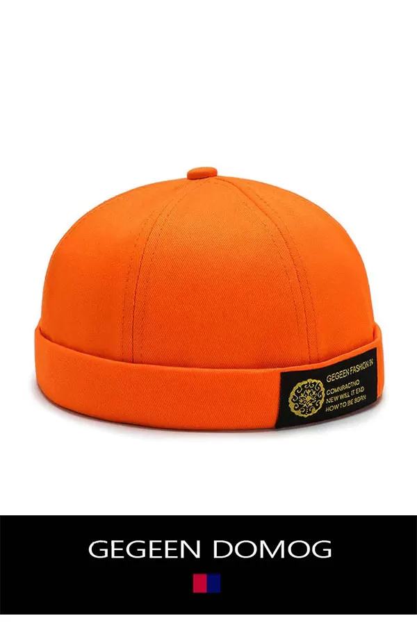 Chapeau orange de marin docker ou aviateur