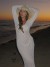 Vestido de playa blanco con cuello en V profundo y mangas largas | 19,34 $ | OKKO MODE