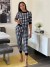 Conjunto Deportivo Mujer Cuadros Blanco Negro | 7,63 $ | OKKO MODE