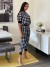 Conjunto Deportivo Mujer Cuadros Blanco Negro | 7,63 $ | OKKO MODE
