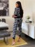 Conjunto Deportivo Mujer Cuadros Blanco Negro | 7,63 $ | OKKO MODE