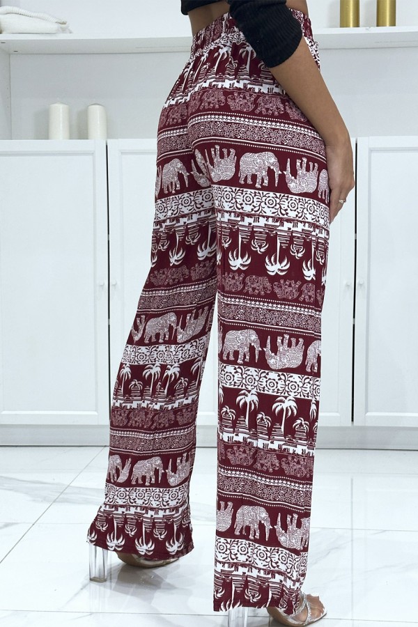 Pantalon palazzo bordeaux à motif palmier - 1