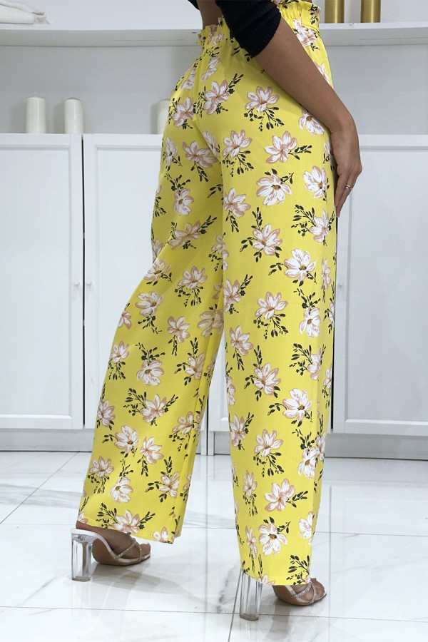 Pantalon palazzo jaune avec motif fleuris - 1