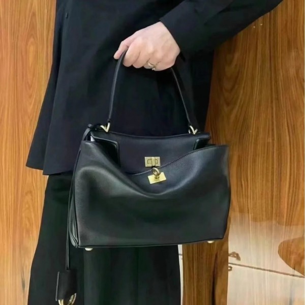 Sac bandoulière noir avec serrure, style décontracté Kelly