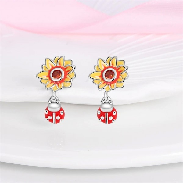 Boucles d'oreilles en argent avec plaque dorée tournesol sans pendentif|4,97 €|OKKO MODE