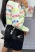 Pull en viscose blanc avec écriture fluo | 5,69 $ | OKKO MODE