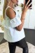 Blouse bleue claire à volant et épaules dénudées effet bouffant. | $3.41 | OKKO MODE