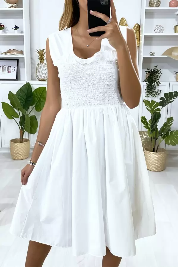Robe patineuse blanche évasé avec perles et élastiques au buste