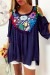 Jolie blouse marine avec magnifique broderie coloré à lavant, épaules dénudé | €20.16 | OKKO MODE