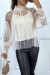Blouse beige en tulle transparent perlé à col haut | 5,25 € | OKKO MODE