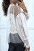 Blouse beige en tulle transparent perlé à col haut | 5,25 € | OKKO MODE