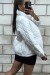 Manteau matelassé blanc très chic et ajustable

 | 20,48 $ | OKKO MODE
