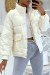 Doudoune Beige mi-longue effet réfléchissant hyper tendance légère et confortable | 18,90 € | OKKO MODE