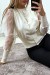 Chaleco beige con mangas transparentes en tul | 6,30 € | OKKO MODE
