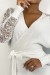 Robe cache-coeur blanche irisé à manches ajourées. | 10,92 $ | OKKO MODE