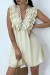 Vestido beige con detalles de volantes y bordado en la parte superior | 8,19 $ | OKKO MODE
