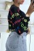 Pull court noir à inscription PARIS LOVE | 6,83 $ | OKKO MODE