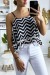 Débardeur zigzag noir et blanc avec volant et mini pompon - Style élégant et fantaisie | 3,15 € | OKKO MODE
