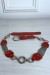 Ceinture rouge en simili avec chêne et accessoire argenté | $1.13 | OKKO MODE