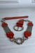 Ceinture rouge en simili avec chêne et accessoire argenté | $1.13 | OKKO MODE