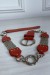 Ceinture rouge en simili avec chêne et accessoire argenté | $1.13 | OKKO MODE