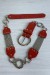 Ceinture rouge en simili avec chêne et accessoire argenté | $1.13 | OKKO MODE