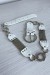 Ceinture blanche en simili avec chêne et accessoire argenté | 1,13 $ | OKKO MODE
