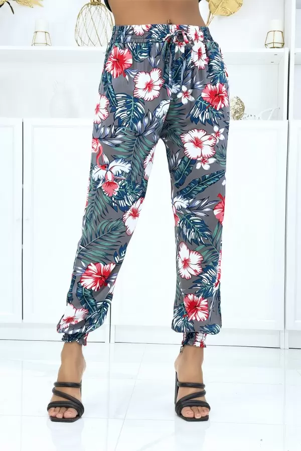 Pantalón gris estampado floral, elástico en cintura y tobillos