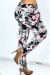 Schwarze Hose mit geradem Schnitt und weitem tropischem Print. | 6,69 $ | OKKO MODE