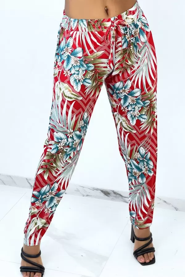 Pantalón rojo fluido a rayas y estampado floral