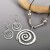 Ensemble de bijoux bohème, boucles d'oreilles et collier en spirale rétro | $4.33 | OKKO MODE