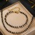 Ensemble de bijoux en acier inoxydable pour femmes avec perles noires | 1,68 £ | OKKO MODE