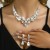 Ensemble de bijoux en cristal pour mariage - Colliers et boucles d'oreilles femme | 2,14 $ | OKKO MODE