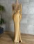 Vestido de noche sin tirantes con lentejuelas y apliques transparentes | 304,28 $ | OKKO MODE