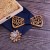 Nœuds papillon en bois avec motifs floraux et design ajouré | $3.21 | OKKO MODE