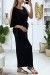 Vestido negro con volante en una manga y detalle dorado en el cuello | 6,83 $ | OKKO MODE