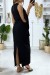 Vestido negro con volante en una manga y detalle dorado en el cuello | 6,83 $ | OKKO MODE